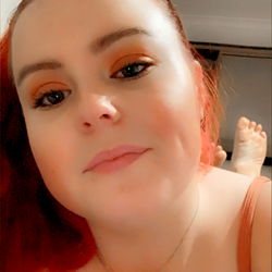 Red-haired woman in a dress