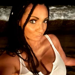 MielaAmore on the beach at night