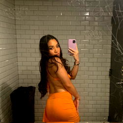 Amanda Model in an Orange Dress