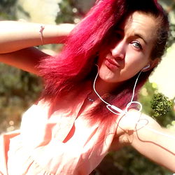 Serbian Female Model with Red Hair and Headphones