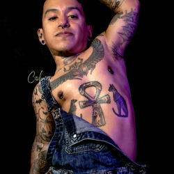 JICA12, a tattooed model strutting her stuff on stage