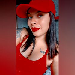 OnlyFans Model in Red Tank Top