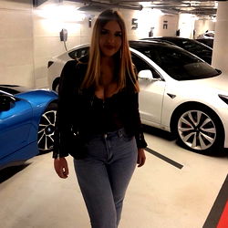 Fashionable Fitness Model Paulina Strikes a Pose in the Garage