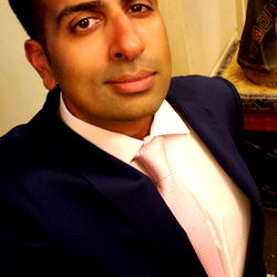 Smoothly Dressed Man with Beard in Suit, Standing