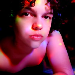 Gabriel Salucci, an OnlyFans model from Rio das Ostras, captured in a vibrant pose