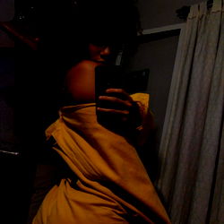 Aisha Lee, an OnlyFans model, captured in a candid moment