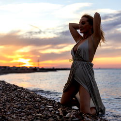Sunset Silhouette of a Woman on the Beach