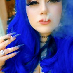 Stylish Blue-Haired Individual in Casual Attire