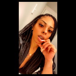 AjilaLeona, a striking young woman