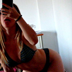 A Photogenic OnlyFans Model in a Bikini Pose