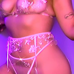 Stylish OnlyFans Model in Glittering Pink Lingerie