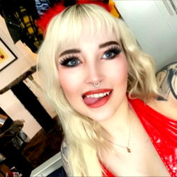 Amethyc, a Norwegian OnlyFans model in red lingerie