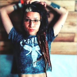 Misticflower - Tigre model photo with confident pose in front of wall