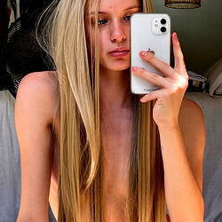 Model with long hair posing for selfie