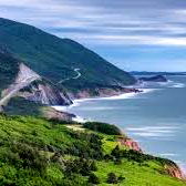 Scenic Coastline View with Mountains and Road