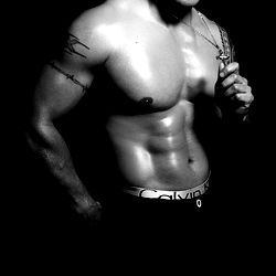 Fit Model in a Tattoo Studio