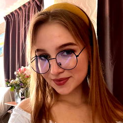 Stylish Woman Wearing Large Glasses and a Headband