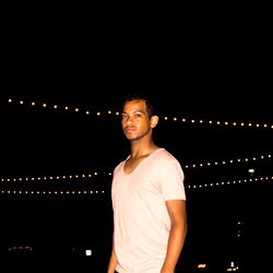 Amante Black at an outdoor event in the evening