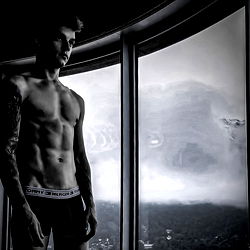 Sexy Model Striking Pose by Window