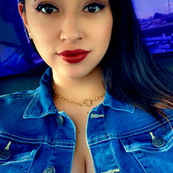 Vibrant Model in Jeans and Tattoos, Aimee