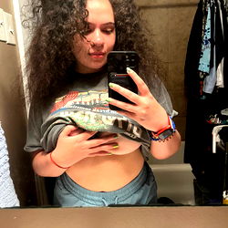 Aliza, 28, Female Model with Curly Hair and Tattoo