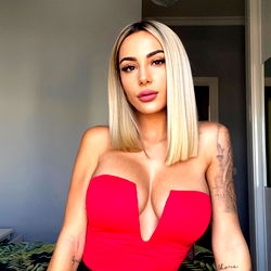 Rocioamarfree: Stunning Onlyfans Model in Red V-Neck Gown