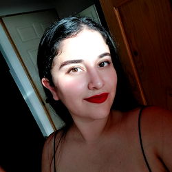 Monica Arias: Stunning Selfie in Front of Window