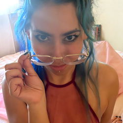 Shiny in glasses on bed