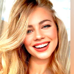 TINA ✨, Beautiful and Smiling Model Posing for a Photo on OnlyFans