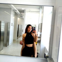 Stylish Selfie in Public Restroom