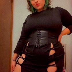 Bea, an OnlyFans model in a revealing ensemble, showcasing her confidence and style.