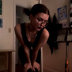 Audie, a Young Woman with Glasses