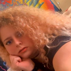 Chili, A Young Woman with Blonde Hair and Blue Eyes