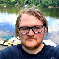 Jarrett, the Bearded Man with Glasses at a Lake