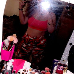 Person in mirror captures bathroom vanity