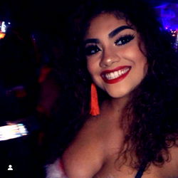 A Smiling Model at a Social Event
