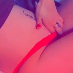 Sexy, seductive OnlyFans model in lingerie showcasing her beauty