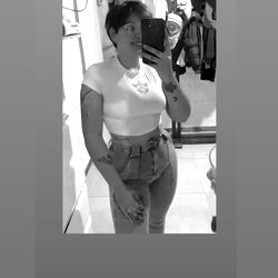 A photo of a woman taking a selfie