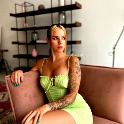 OnlyFans Model Sitting on Couch