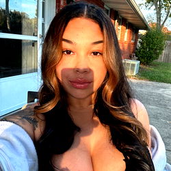 A Beautiful Woman Smiling at the Camera