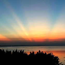 Serene Sunset Over a Calm Lake