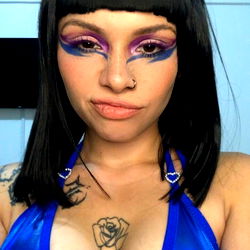 Sakura Kinomoto, OnlyFans Model - Photograph in Blue Bikini with Tattoos and Piercing