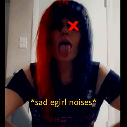 Emo-Looking Individual with Red Hair and Red Makeup on Nose