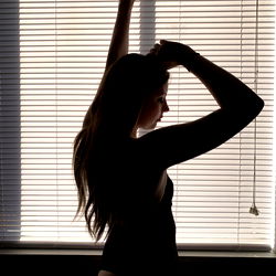 Lily Ann Lane, OnlyFans Model, Showcasing Her Elegant Silhouette