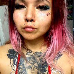 Luna, an OnlyFans Model with Tattoos and Pink Hair