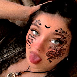 Katelain Osborne - OnlyFans Model with Face Paint