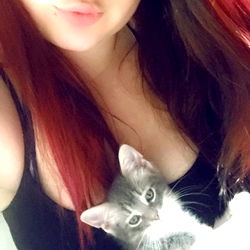 Athena, A Michigan Model With Her Feline Companion