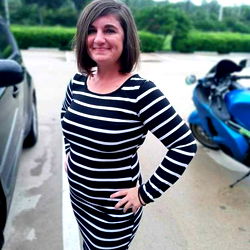 Pregnant Woman in Striped Dress