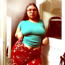 Arch Queen, Stunning OnlyFans Model in Red Tie-Dye Pants