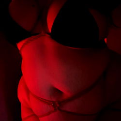 Visionary Northern Irish Model Lia Captivates with Red Corset Photo